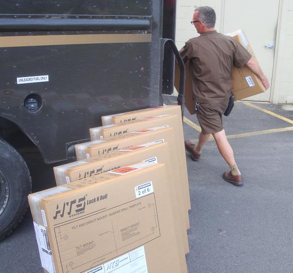 UPS route driver Joel loads HTS customer orders