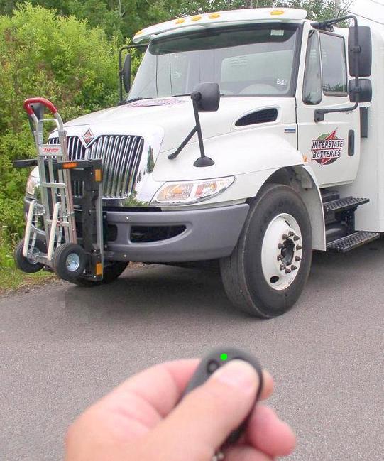 Unlock and release the hand truck with the push of a button.