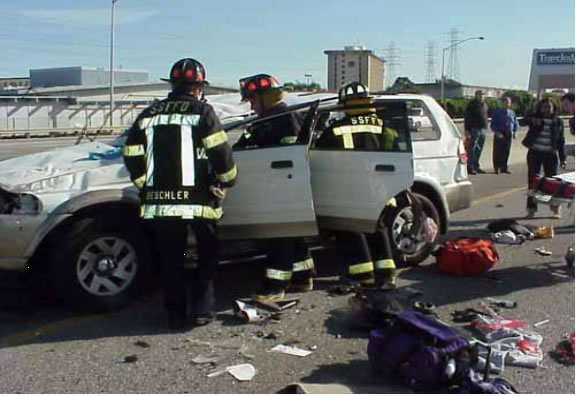 HAND TRUCK FALLS ON HIGHWAY CAUSES ACCIDENT